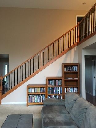 We refinished & painted the wooden railings as well as the walls and ceiling in this home.