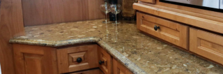 Granite, marble, and quartz countertops are beautiful and easy to maintain, ideal for remodeled kitchens and bathrooms. We custom fabricate the stone countertops at our in-house Milwaukee workshop.